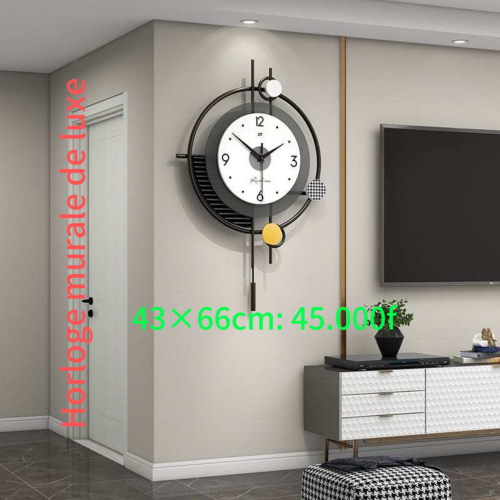 Horloge murale décorative. - Dimension : 43×66cm.