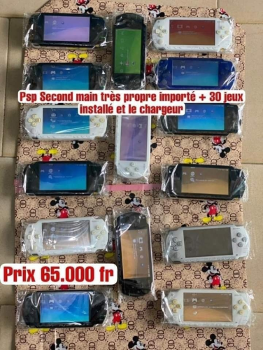 Psp Quasi neuve Craquée (30 Jeux installés)